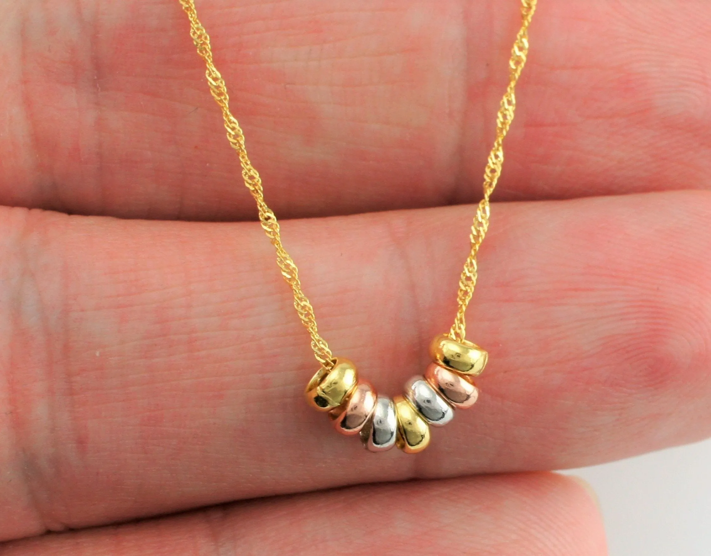 9ct Gold Yellow, White & Rose Gold 7 Mini Lucky Rings Pendant Necklace